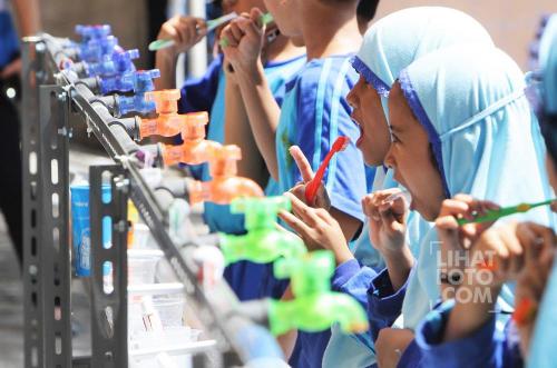 gosokgigi-lihatfoto-gayahidup